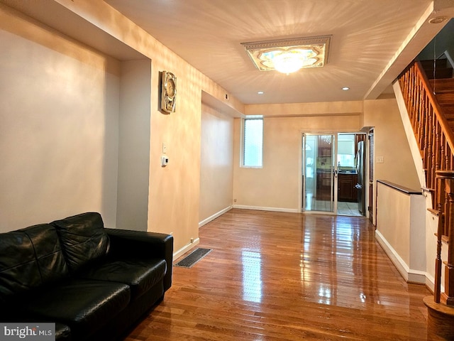 living room with hardwood / wood-style flooring