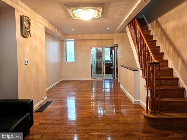 interior space with hardwood / wood-style flooring