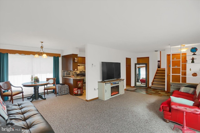 carpeted living room with plenty of natural light