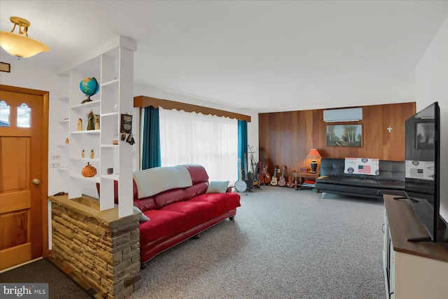 living room with carpet flooring, a wall unit AC, and wooden walls