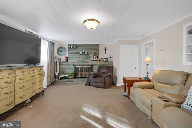 carpeted living room with crown molding, a fireplace, and wooden walls