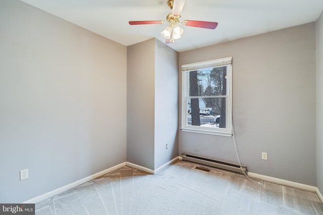 carpeted spare room with a baseboard radiator and ceiling fan