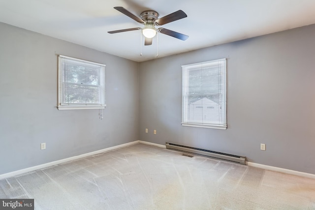 unfurnished room featuring ceiling fan, a baseboard radiator, and light colored carpet