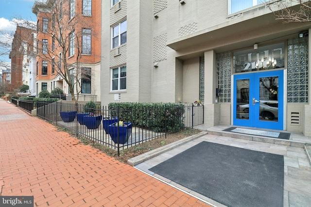 property entrance featuring french doors