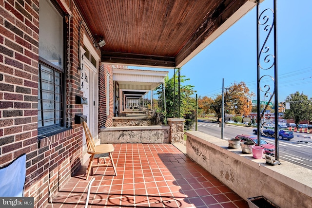 view of patio featuring covered porch