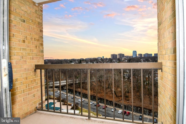 view of balcony at dusk