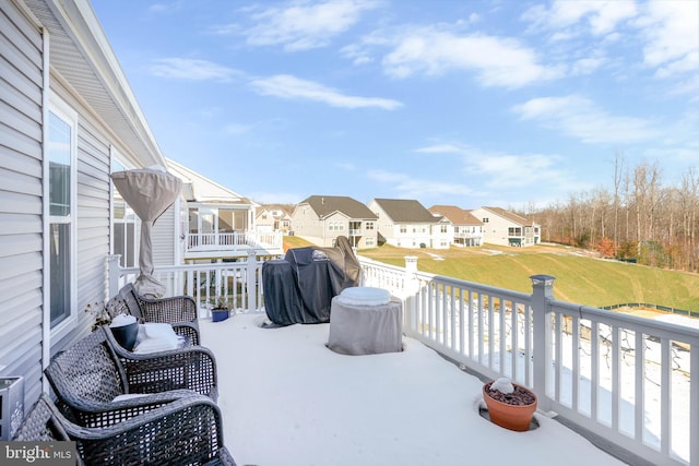 view of patio / terrace with a grill and a sunroom