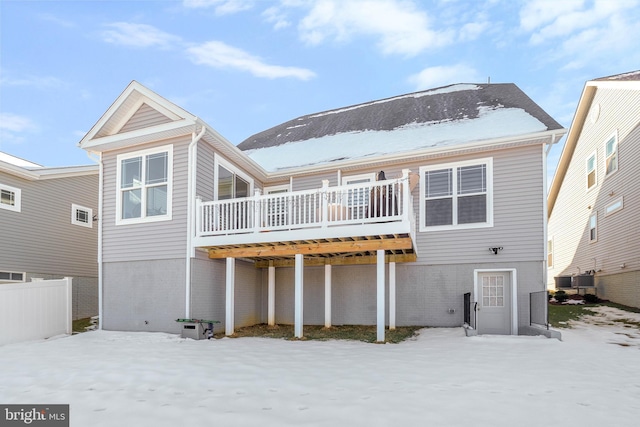 back of house featuring a deck