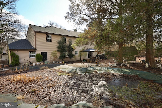 back of property with a patio area