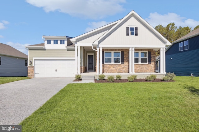 craftsman house with a garage, a porch, and a front yard