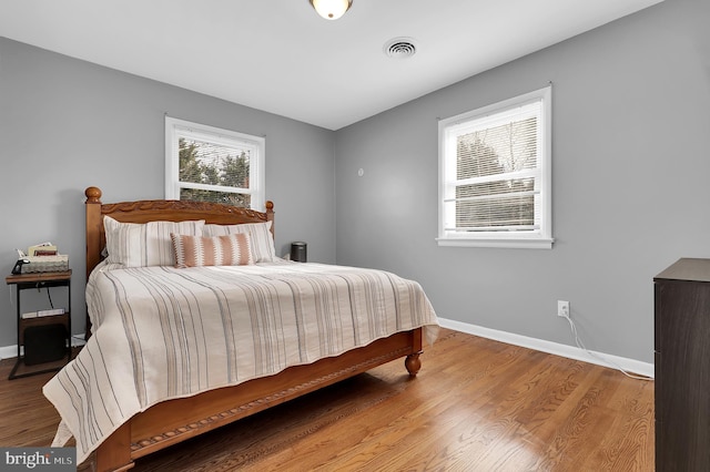 bedroom featuring hardwood / wood-style floors