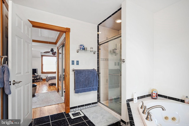 bathroom with tile patterned floors and separate shower and tub