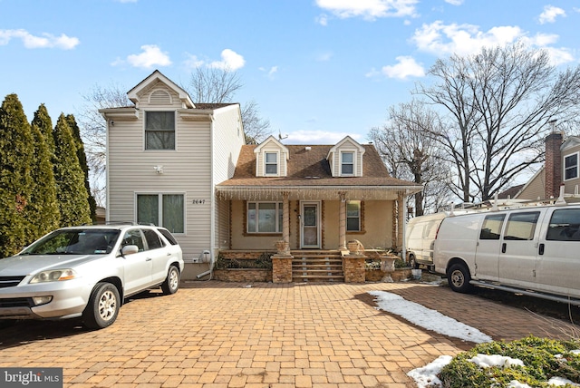 view of property featuring a porch