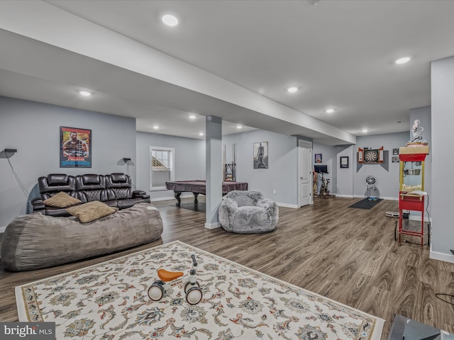 living room featuring hardwood / wood-style flooring and pool table