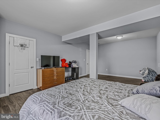 bedroom featuring dark hardwood / wood-style floors