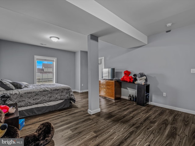 bedroom featuring dark hardwood / wood-style floors