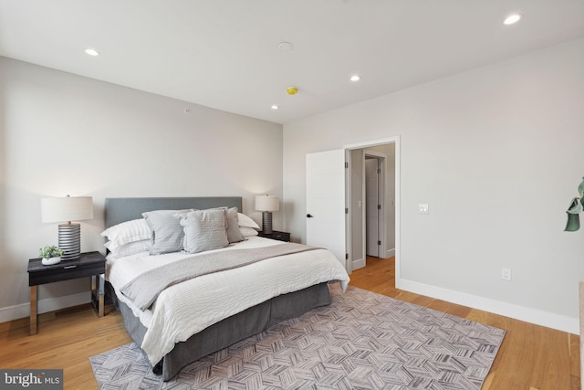 bedroom featuring light wood-type flooring