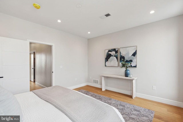 bedroom featuring light hardwood / wood-style floors