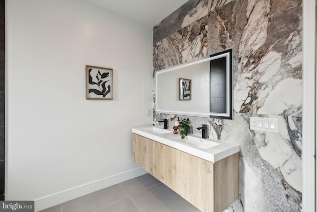 bathroom with tile patterned flooring and vanity