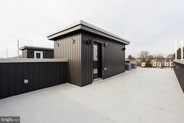 view of home's exterior with central AC unit