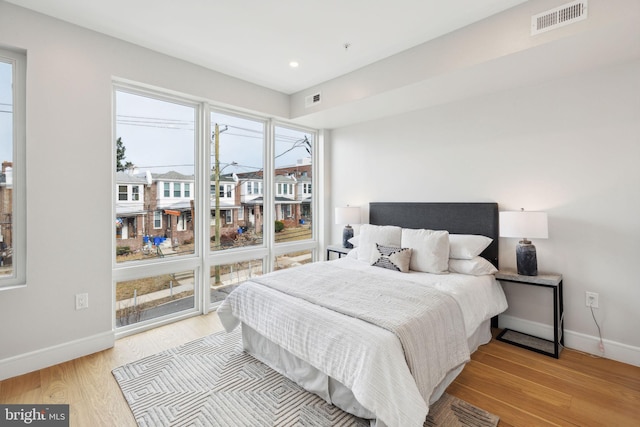 bedroom featuring light wood-type flooring