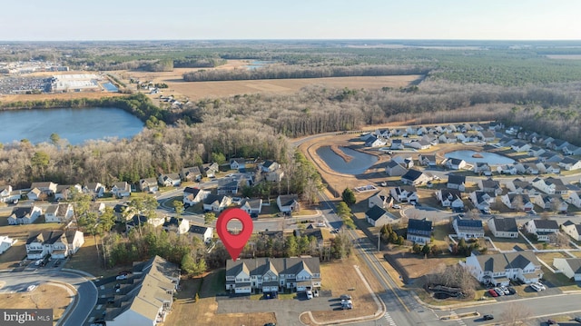 aerial view featuring a residential view and a water view