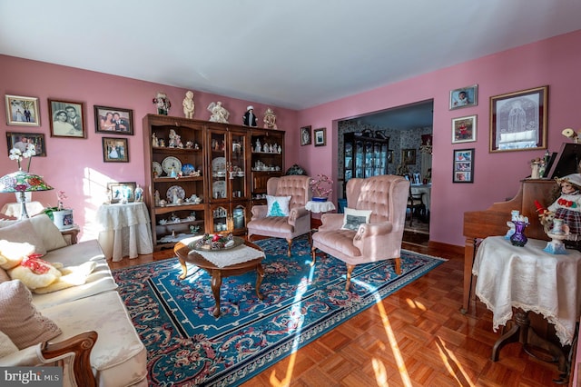 living room with parquet flooring