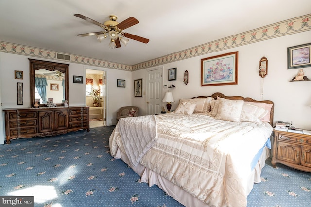 carpeted bedroom featuring ceiling fan and connected bathroom