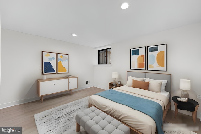 bedroom featuring light wood-type flooring