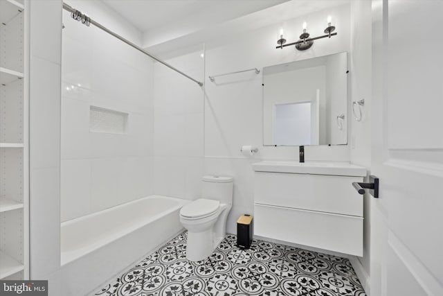 full bathroom featuring tiled shower / bath combo, tile patterned floors, vanity, and toilet