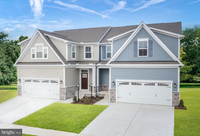 craftsman-style home with a garage and a front lawn