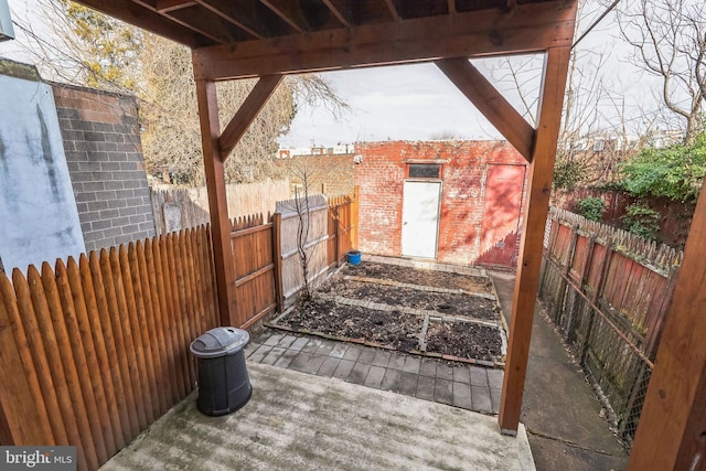 view of patio / terrace featuring an outbuilding