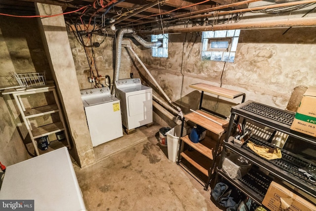 basement with washing machine and clothes dryer