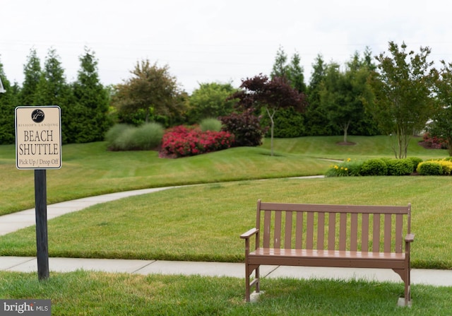 view of community featuring a yard