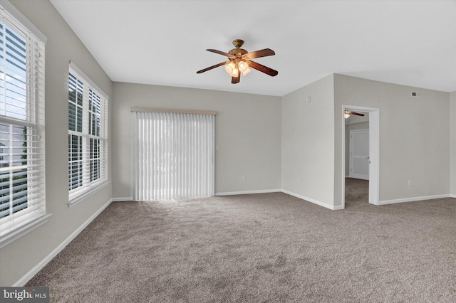 spare room with ceiling fan and carpet floors