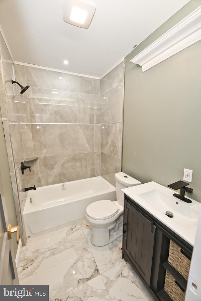 bathroom with toilet, marble finish floor, vanity, and bathing tub / shower combination