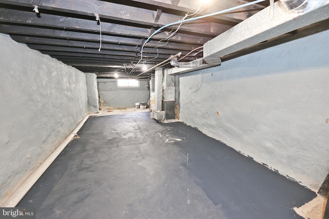 unfinished basement with heating unit