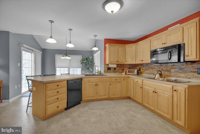 kitchen with decorative light fixtures, kitchen peninsula, light brown cabinetry, and black appliances