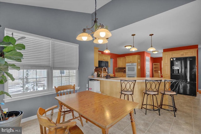 tiled dining space with sink