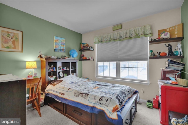 bedroom with light carpet