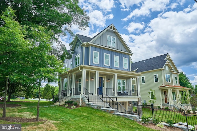 view of front of home featuring a porch and a front yard