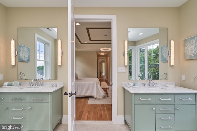 bathroom featuring tile patterned flooring and vanity