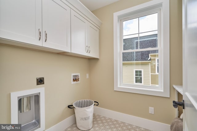 laundry room with cabinets, washer hookup, and hookup for an electric dryer