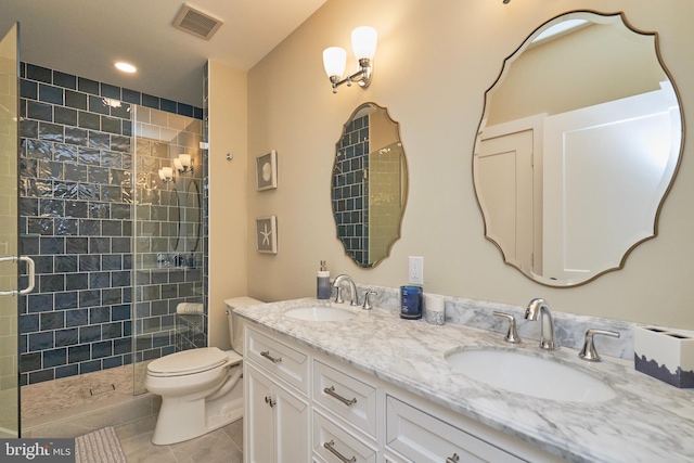 bathroom with walk in shower, tile patterned floors, toilet, and vanity