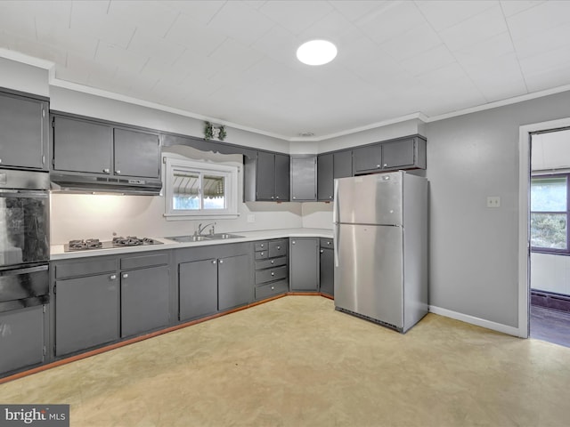 kitchen featuring gray cabinetry, sink, crown molding, and appliances with stainless steel finishes