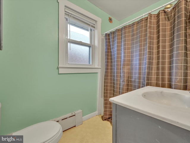 bathroom featuring a shower with curtain, vanity, toilet, and a baseboard heating unit