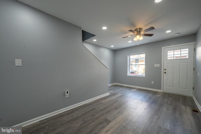 entrance foyer featuring ceiling fan and dark hardwood / wood-style flooring