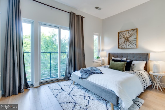 bedroom with light hardwood / wood-style flooring