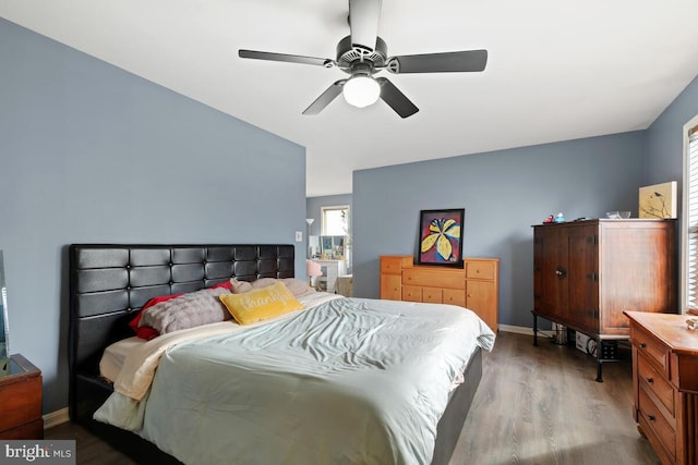 bedroom with ceiling fan and light hardwood / wood-style flooring