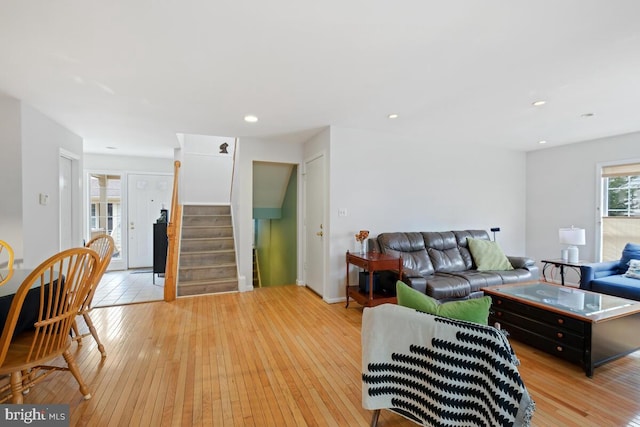 living room with light hardwood / wood-style flooring